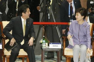 Abe talking to Park Geun-Hye earlier this week.