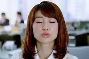 A member of AKB48 shows their "kissing face"