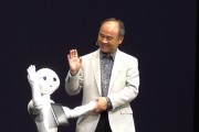 Softbank CEO Son Masayoshi with Pepper, the Japanese robot who can feel emotions.