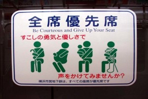 Man kicks highschool girl down the stairs at Yokohama station in revenge attack after girl used smartphone in priority seating on train carriage.