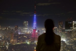 Tokyo tower lit up in French colours to show solidarity with France